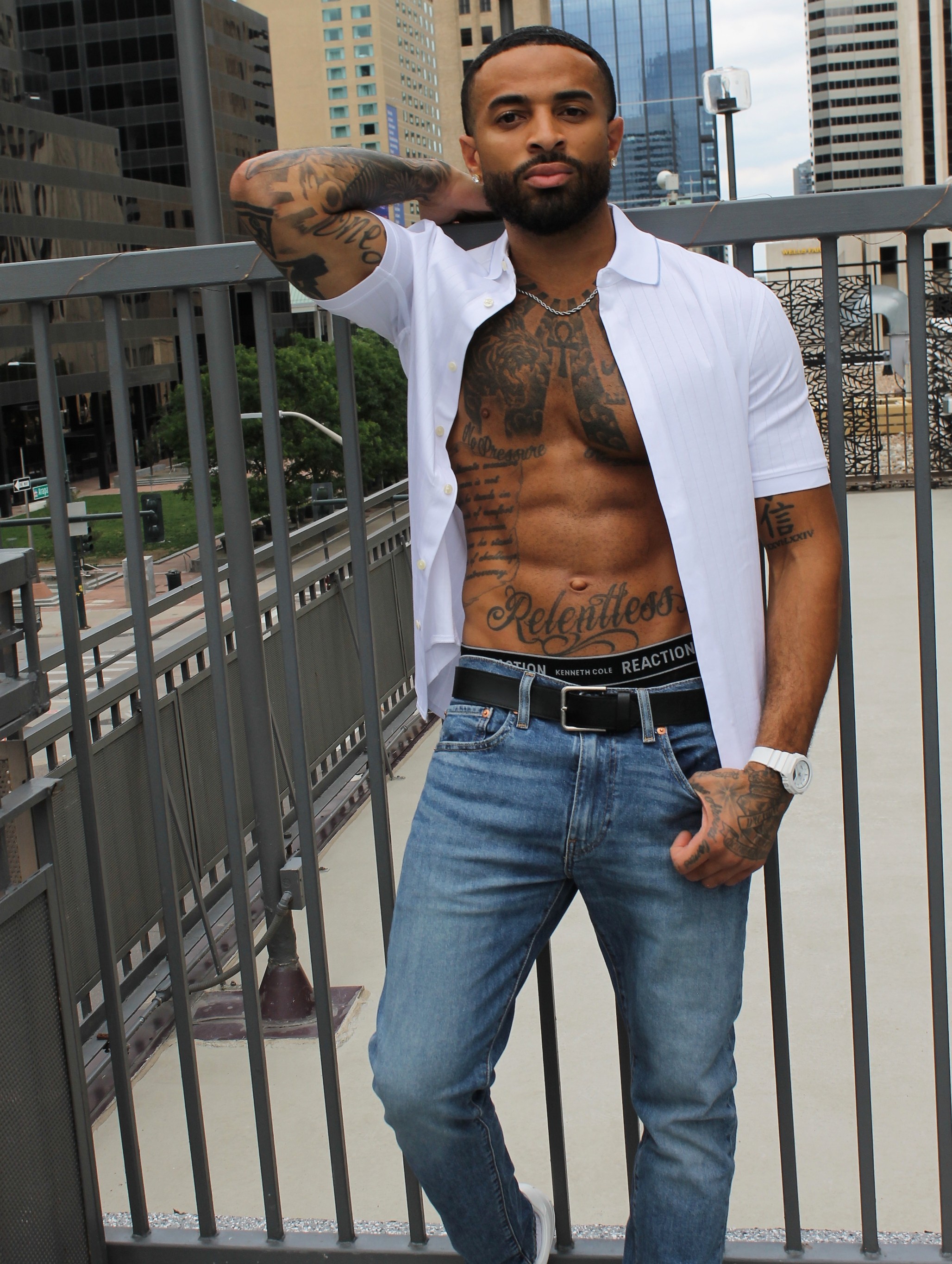 James Muhammad commercial portrait in a white knit polo