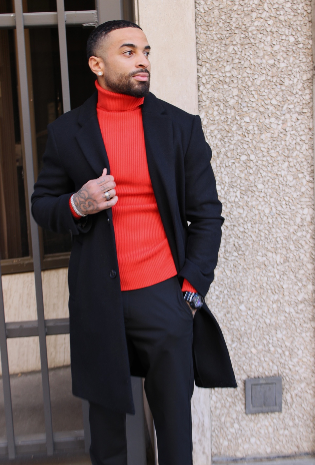 James Muhammad commercial fashion portrait in a red turtleneck and black coat