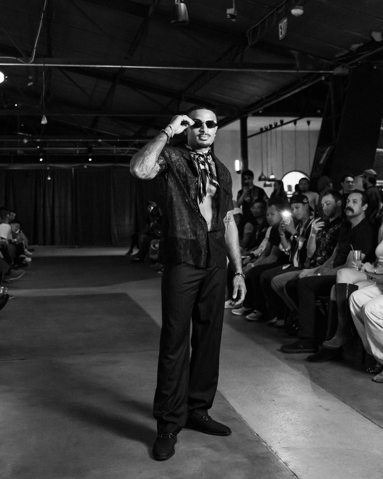 James Muhammad black and white runway portrait in black lace shirt